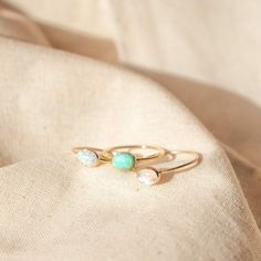 These rings feature a beautiful oval-shaped gemstone. Available in moonstone, turquoise or opal - these rings are perfect for stacking to match your style. Don't know your ring size? Ring Size Guide or Buy Ring Sizer …………………………………. Details: Available in 14k Gold Filled or Sterling Silver Waterproof and can be worn everyday Size Inclusive and made to order Natural Rainbow Moonstone Natural Mona Lisa Turquoise Opal is Synthetic About Your Jewelry If you are not wearing your jewelry it is best to s Dainty Oval Stackable Birthstone Ring, Stackable Oval Midi Rings As Gift, Stackable Oval Midi Rings For Gift, Stackable Oval Midi Rings Gift, Dainty Oval Stackable Midi Rings, Everyday Oval Stackable Rings With Birthstone, Dainty Oval Stackable Rings With Birthstone, Adjustable Oval Gemstone Midi Rings, Adjustable Oval Gemstone Stackable Rings