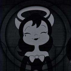 an animated character with horns on it's head and eyes, sitting in front of a