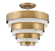 a semi flush light fixture with marble and brass accents on the bottom half of it