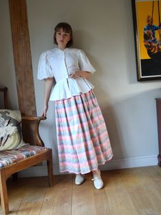 "A stunning vintage Bellville Sassoon silk skirt, from the 1980s. Made in England The outer fabric is a pure silk, stiff and shiny with a beautiful pastel stripe pattern. The skirt is also lined with stiff synthetic fabric, and has a tulle ruffled hem for more volume. Full design with great movement and a very satisfying rustling sound. In very good vintage condition. The raw silk has a naturally rough texture, but the imperfections are just part of its charm! Marked as a size 14, but comes up s Vintage Silk Long Skirt, Vintage Tiered Skirt For Daywear, Vintage Gathered Maxi Skirt For Spring, Vintage Fitted Maxi Skirt With Gathered Detail, Vintage Voluminous Skirt For Summer, Vintage Full Maxi Skirt With Gathered Details, Vintage Voluminous Skirt For Spring, Vintage Pleated Maxi Skirt, Vintage Tiered Gathered Skirt