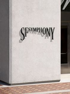 there is a sign on the side of a building that says symphony