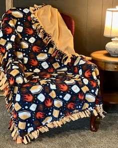 a chair with a blanket on top of it