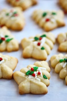 christmas cookies are arranged on a baking sheet