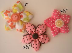 three different types of fabric flowers on a white surface with measurements for each flower size