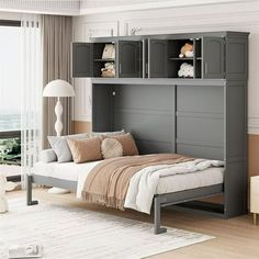 a bedroom with a bed, dresser and bookcases in the middle of it