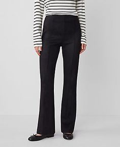 Elevate your wardrobe with the Ann Taylor Faux Suede Skinny Flare Pants, a chic blend of contemporary design and classic elegance. These pants are meticulously crafted to enhance your silhouette, featuring a high-rise waist that sits just below the natural waistline, and a flare leg that begins at the knee for a dramatically stylish finish.

- Size: 10
- Color: Black
- Material: 96% Polyester, 4% Spandex
- Fit: Tailored and fitted with a flared leg
- Length: Full length with a 31" inseam and 18 Suede Flare Pants, Women's Black Dress, Flare Pant, Dress Pant, Classic Elegance, Flare Pants, Stylish Women, Effortless Style, Side Zipper