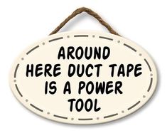 a sign that says around here duct tape is a power tool