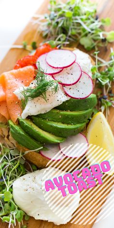 a wooden cutting board topped with cucumbers, radishes and other veggies