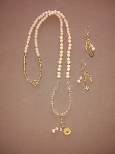 charm necklace with earrings