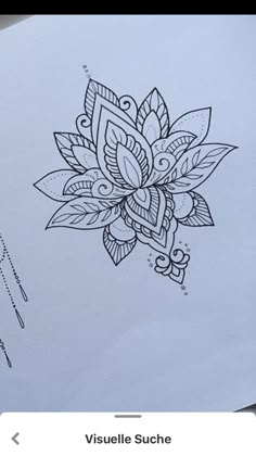 an image of a flower drawn on paper