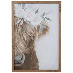 a painting of a horse with flowers in it's hair is hanging on the wall