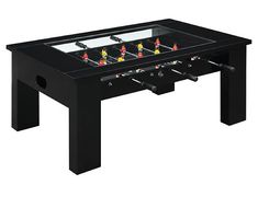 a foosball table is shown in black and features three people playing soccer on it