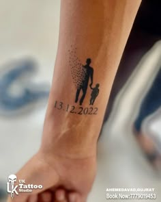 a person with a small tattoo on their arm