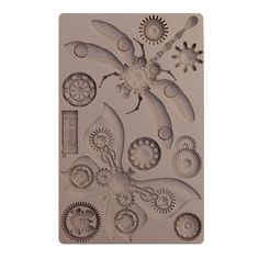 a cookie sheet with gears and wheels on it