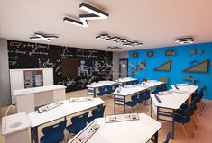 a classroom with desks and chalkboards on the wall in front of a blackboard