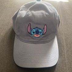 Disney Lilo & Stitch Baseball Hat Ohana Family Grey Adjustable, Disney Adjustable Baseball Cap, Adjustable Disney Baseball Cap, Disney Adjustable Cap, Adjustable Disney Cap, Lilo And Stitch Birthday, Stitch Merchandise, Stitch Items, Ohana Family, Lilo And Stitch Merchandise