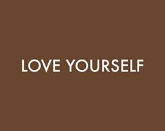 the words love yourself on a brown background