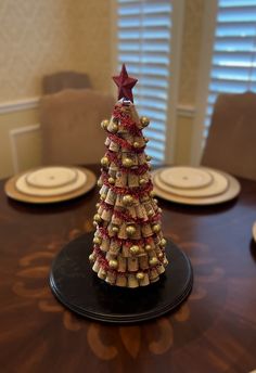 a small christmas tree made out of wine corks