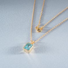 Introducing our exquisite March Birthstone necklace, featuring a stunning rectangle-cut aquamarine set in 14K solid gold. The tranquil blue tones of the aquamarine evoke the soothing essence of ocean waves, making it a fabulous addition to your jewelry collection. Crafted with meticulous attention to detail, this necklace is not just a beautiful accessory, but a representation of quality and authenticity. The 14K solid gold creates a radiant and luxurious backdrop for the aquamarine stone, ensur Baguette Pendant, March Birthstone Necklace, Tranquil Blue, Aquamarine Studs, Aquamarine Bracelet, Solid Gold Necklace, March Birthstone, Aquamarine Stone, Birthstone Pendant