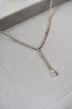 Vintage Rhinestone Lariat Necklace.  Length: 16 1/2" Vintage condition! For more necklaces: https://www.etsy.com/shop/SusVintage?section_id=14148238 Back to the shop: https://www.etsy.com/shop/SusVintage?ref=hdr_shop_menu Don't hesitate to contact me if you have any further questions. Thank you for looking!! Crystal Necklaces, Lariat Necklace, Vintage Rhinestone, Necklace Length, Crystal Necklace, Necklace Etsy, Jewelry Necklaces, Accessory Gift, Pet Supplies