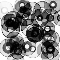 an abstract black and white photo with circles