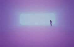 a person standing in the middle of a foggy room with an empty rectangular window