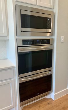 two ovens are built into the wall in this kitchen