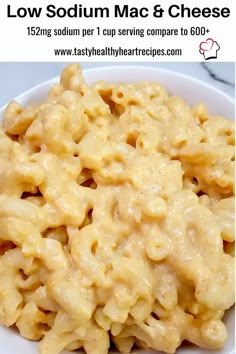 macaroni and cheese is in a white bowl