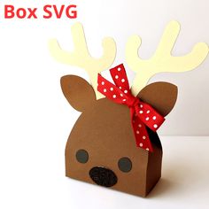 a cardboard box with a reindeer's head and red bow on it that says box svg