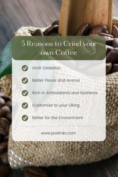 a bag filled with coffee beans on top of a wooden table