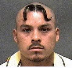 a man with a moustache on his head is shown in this mug shot