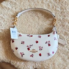 Gorgeous New With Tags Coach Ladybug Floral Payton Hobo Shoulder Bag Is In Excellent New Condition. Stunning Chalk Leather With Adorable Red Ladybug And Pink Fliral Design And Gold Logo Badge And Hardware. Top Zipper Closure With 1 Open Sidewall Pocket Inside. Tags, Booklet, And All Packing Materials Are Included. It Measures Approximately 11" By 7 1/2". Guaranteed Authentic. A Very Sweet And Dressy Bag For That Special Outing! From Non-Smoking Home. Pink Gift Ideas, Hobo Shoulder Bag, Cute Handbags