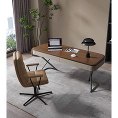 an office desk with a laptop on it and a chair next to it in front of a window