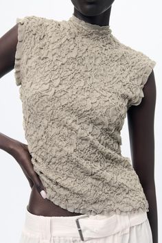 WRINKLED EFFECT KNIT TOP - Stone | ZARA United States Chic Textured Fitted Blouse, Chic Fitted Textured Blouse, Sleeveless Ruched Beige Tops, Stretch Knit Top With Ruffles For Summer, Stretch Ruffle Knit Top For Summer, Beige Sleeveless Ruched Top, Beige Ruched Sleeveless Top, Summer Ruffled Stretch Knit Top, Summer Stretch Knit Top With Ruffles