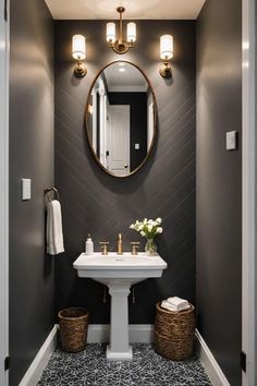 a white sink sitting under a mirror in a bathroom