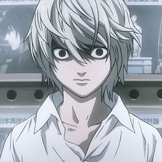 an anime character with white hair and black eyes looking at the camera while standing in front of some shelves