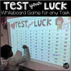 a child writing on a board with the words test your luck