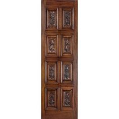 a wooden door with carvings on it