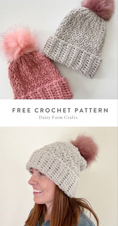 two knitted hats with pom - poms, one in pink and the other in