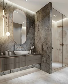 an elegant bathroom with marble walls and flooring