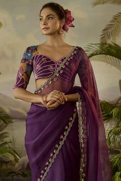 Baise Gaba features a mesmerizing Purple Saree Set that captivates with its elegance. The eye-catching piece is crafted in organza with cutwork and zardosi hand embroidery. It is paired with a modal satin printed blouse piece. Accessorize the designer saree set with statement earrings and heels for a festive occasion or sangeet ceremony. #Perniaspopupshop #womenswear #ethnic #whatiworewastrending #ppuslove #sareeset #chiffon #georgette #handembroidery #weddingwear #festivewear #sangeet Saree Borders Ideas, Sangeet Outfit Saree, Chiffon Blouse Designs For Saree, Saree Border Work Designs, Blouse Designs Organza Saree, Printed Saree Blouse Design, Organza Sarees Blouses Design, Blouse For Organza Saree, Modern Blouse Designs Saree