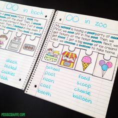 two notebooks with pictures of food and words on them, one is in the zoo