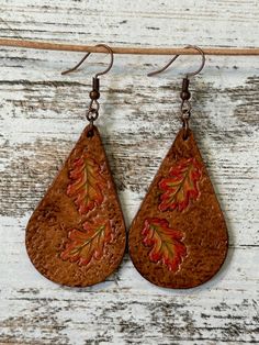 Teardrop tooled leather fall leaf earrings Stamp Earrings, Oak Acorn, Football Earrings, Fall Leaf, Tooled Leather, Handcrafted Leather, Leaf Earrings, Leather Tooling, Down Hairstyles