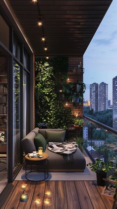 the balcony is decorated with greenery and lit candles