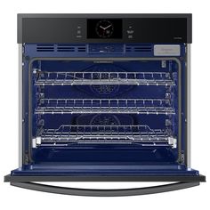 an oven with its door open and the light on, showing it's bright blue interior