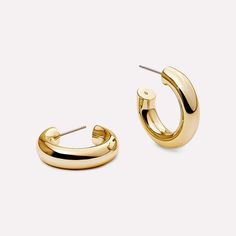 These small gold hoop earrings are the ear-stack staple your collection needs. Dipped in 14k gold, these small gold hoop earrings are modern, chic, and perfect for every day. Can't get enough of this classic design? You'll love our Tia Medium and Tia Small hoops just as much. • Dipped in 14k gold • Perfect for everyday wear • Hoop earring staple Small Gold Hoop Earrings Aesthetic, Gold Mini Hoop Earrings, Gold Hoop Earrings Aesthetic, Mini Gold Hoops, Realistic Wishlist, Small Hoops Earrings, 2024 List, Hoop Earrings Aesthetic, Gold Hoops Earrings