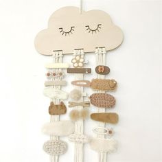 Description: Using this ornament can help to display girl's hair bows, clips, headbands, hair rings and so on, it can be placed on the wall which is tidy-keeping and space-saving. What this hairpin holder can offer you is that can be used as a perfect decoration to make your room more elegant and beautiful, it adopts a cute cloud shape and long tassel design which is very adorable and attractive. Made of cotton line and wood, it is very eco-friendly and durable. The length of this hairpin holder Hair Clip Storage, Headband Storage, Hair Clip Organizer, Hair Product Storage, Bow Storage, Headband Organizer, Hair Accessories Storage, Diy Clouds, Bow Organizer