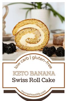 a cake roll with blackberries on top and the words, low carb gluten free keto banana swiss roll cake