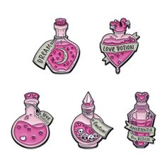 four pink bottles with labels on them and one has a heart shaped bottle in the middle