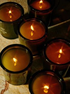 several candles are sitting on a table